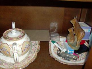 tea pot and cow